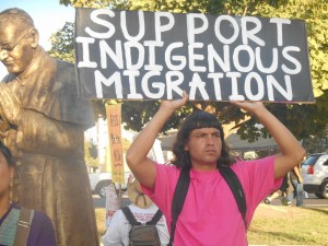 Protestor seeking aid for immigrants in Los Angeles.